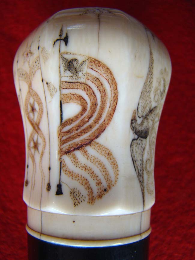 A RARE and beautiful 19th century American presentation walking stick with an eight sided scrimshawed ivory knob and a spiral twist entwined rope pattern dark rosewood shaft. — image 5